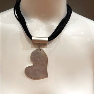 Leather necklace with pewter heart.